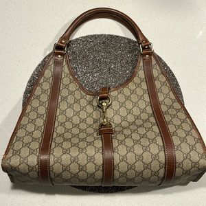 Gucci~ shoulder bag.